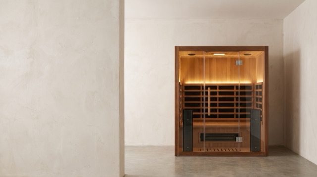 Indoor infrared sauna — evening homepage hero